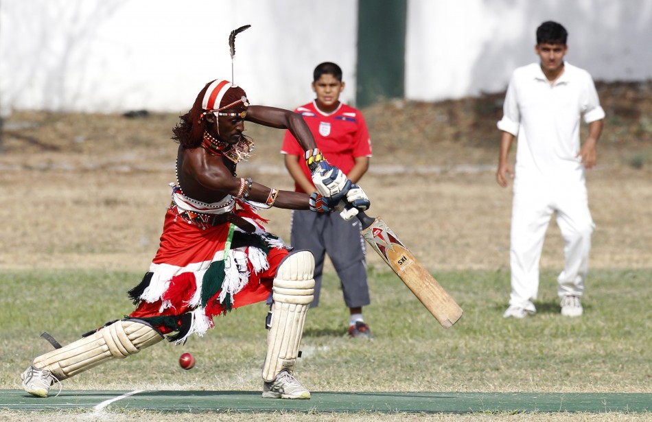 Jonathan Ole Meshami of the Maasai Cricket Warriors plays a shot during their friendly match in Mombasa