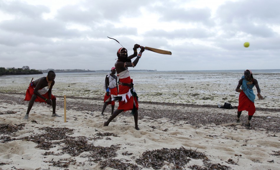 Members of the Maasai Cricket Warriors attend a practice session at the shores of the Indian Ocean in the Kenyan coastal city of Mombasa
