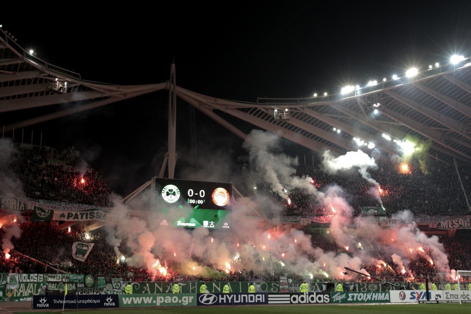 Panathinaikos fans hold flares
