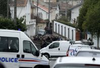 French police conduct their investigation outside the Ozar Hatorah Jewish school in Toulouse, southwestern France