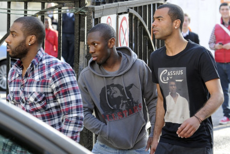 Ashley Cole (R) and Shaun Wright Phillips (C) arrive at the London Chest Hospital in east London