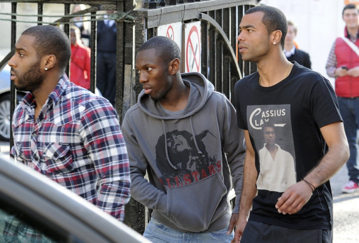 Ashley Cole (R) and Shaun Wright Phillips (C) arrive at the London Chest Hospital in east London