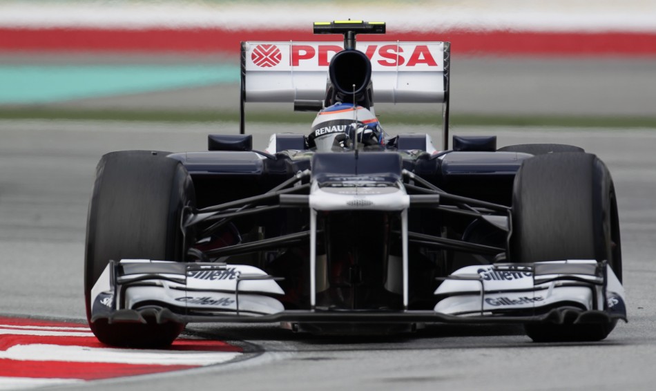 Williams Formula One driver Senna drives during the first practice session of the Malaysian F1 Grand Prix at Sepang International Circuit outside Kuala Lumpur