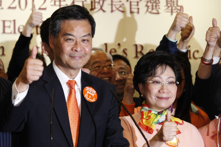 The next Hong Kong Chief Executive Leung celebrates with his wife Regina Tong in Hong Kong
