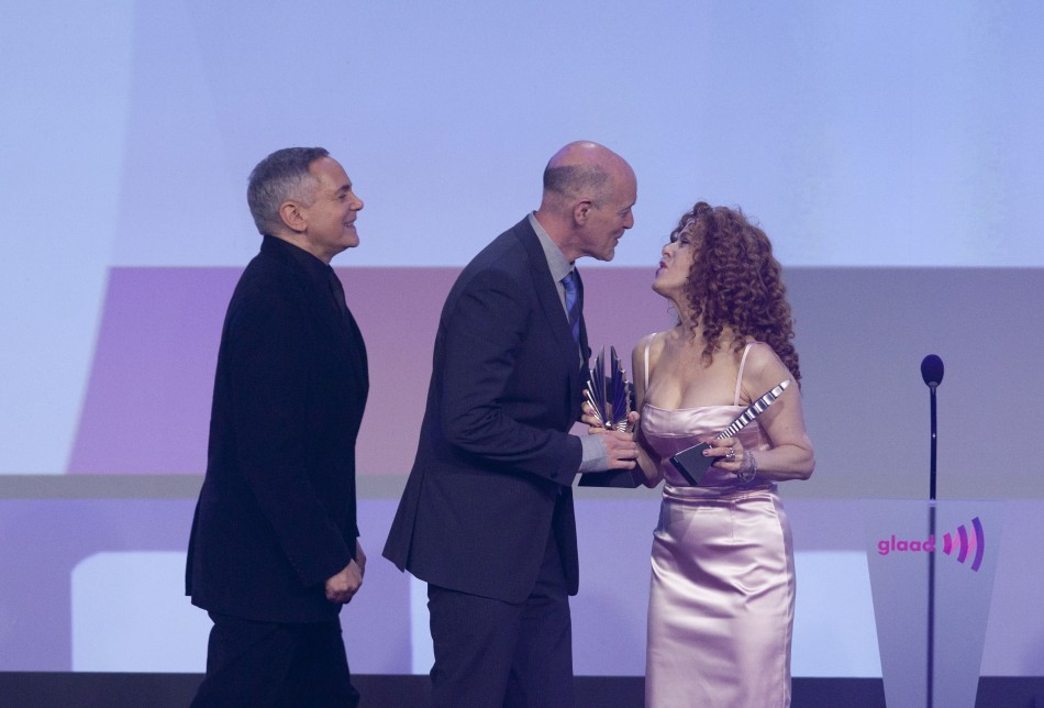 Producers Zadan and Meron accept their award from actress Bernadette Peters at the 23rd annual GLAAD Media Awards in New York