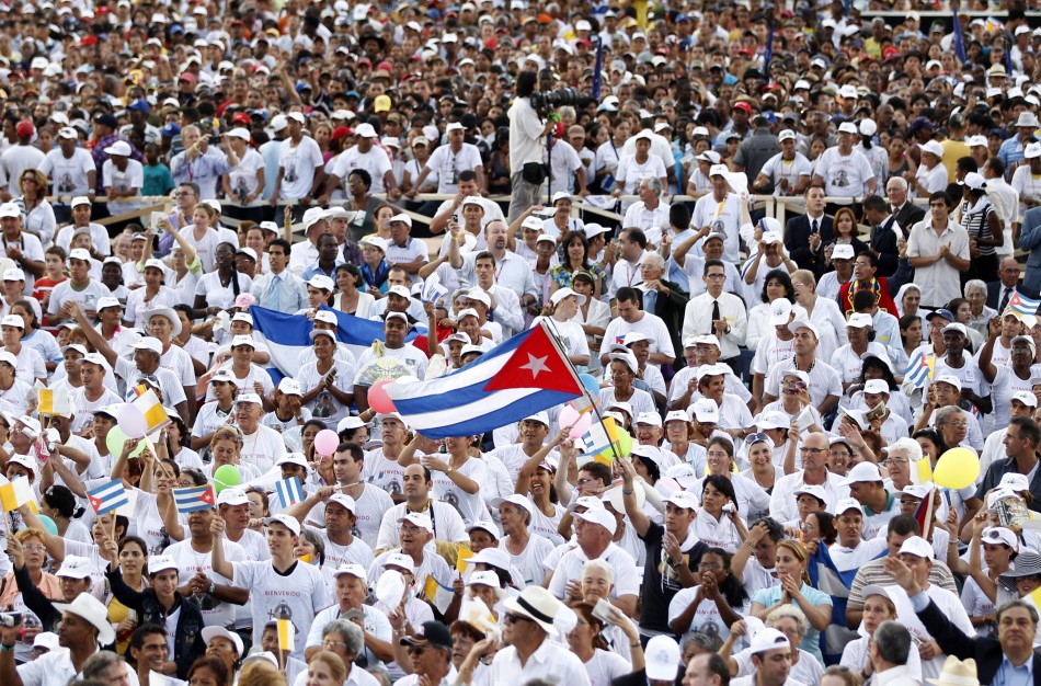 A man waves a Cuban flag