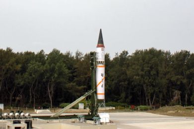 India's nuclear-capable Agni-III missile is seen before its third flight launch system at Wheeler Island