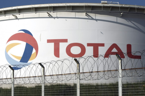 Qatar Investment Fund hikes its stake in French oil and gas giant Total SA.