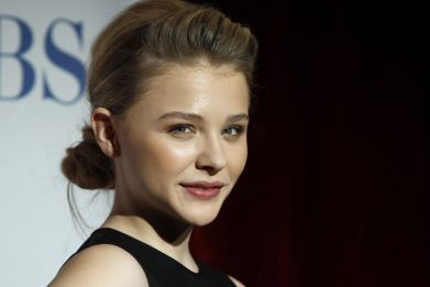 Actress Chloe Grace Moretz poses backstage in the photo room at the 2012 People's Choice Awards in Los Angeles