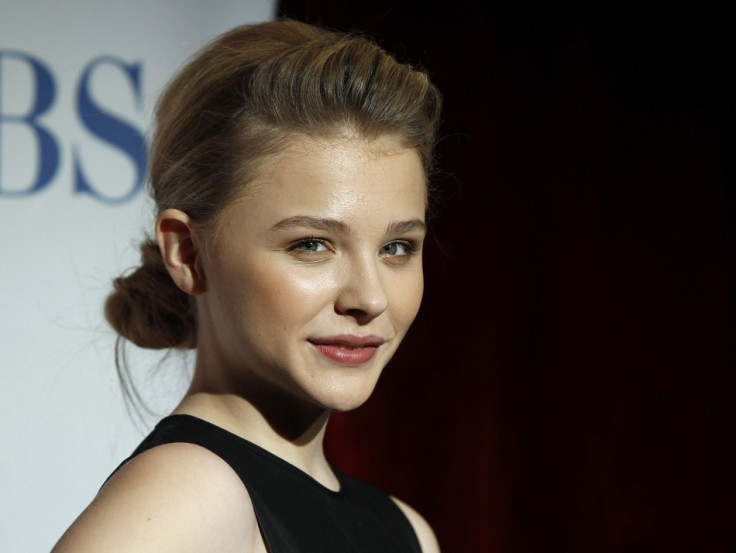 Actress Chloe Grace Moretz poses backstage in the photo room at the 2012 People's Choice Awards in Los Angeles