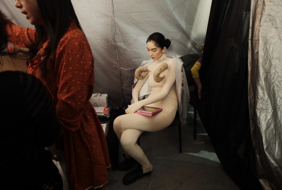 A model is pictured backstage at China Fashion Week in Beijing