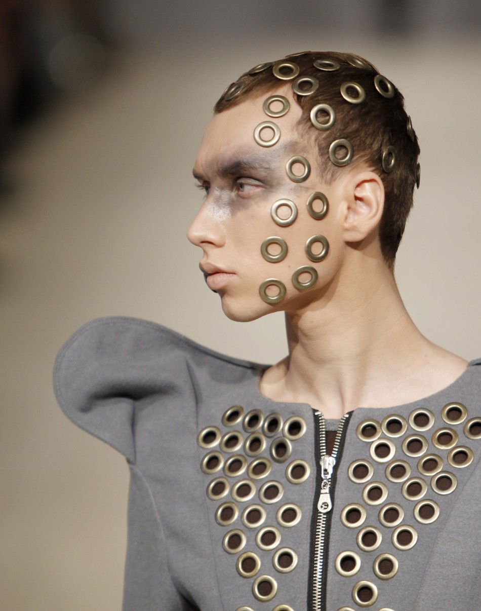 A model presents a creation by Ukrainian designer Komardina during Ukrainian Fashion Week in Kiev