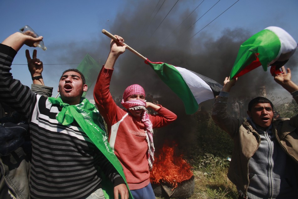 Palestinian protesters during a protest marking Land Day, near the border between Israel and the northern Gaza Strip