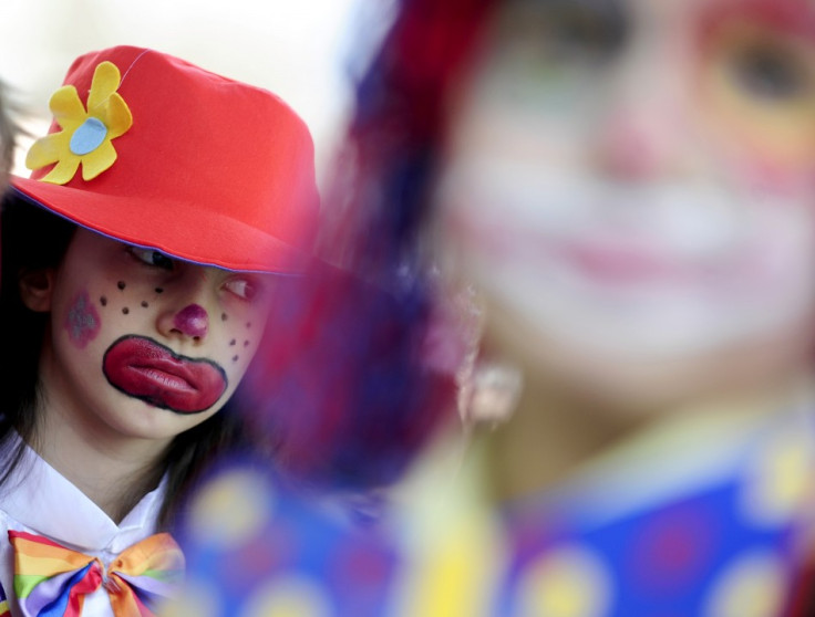 A child in a costume reacts during a traditional April Fool&#039;s Day celebration in Skopje