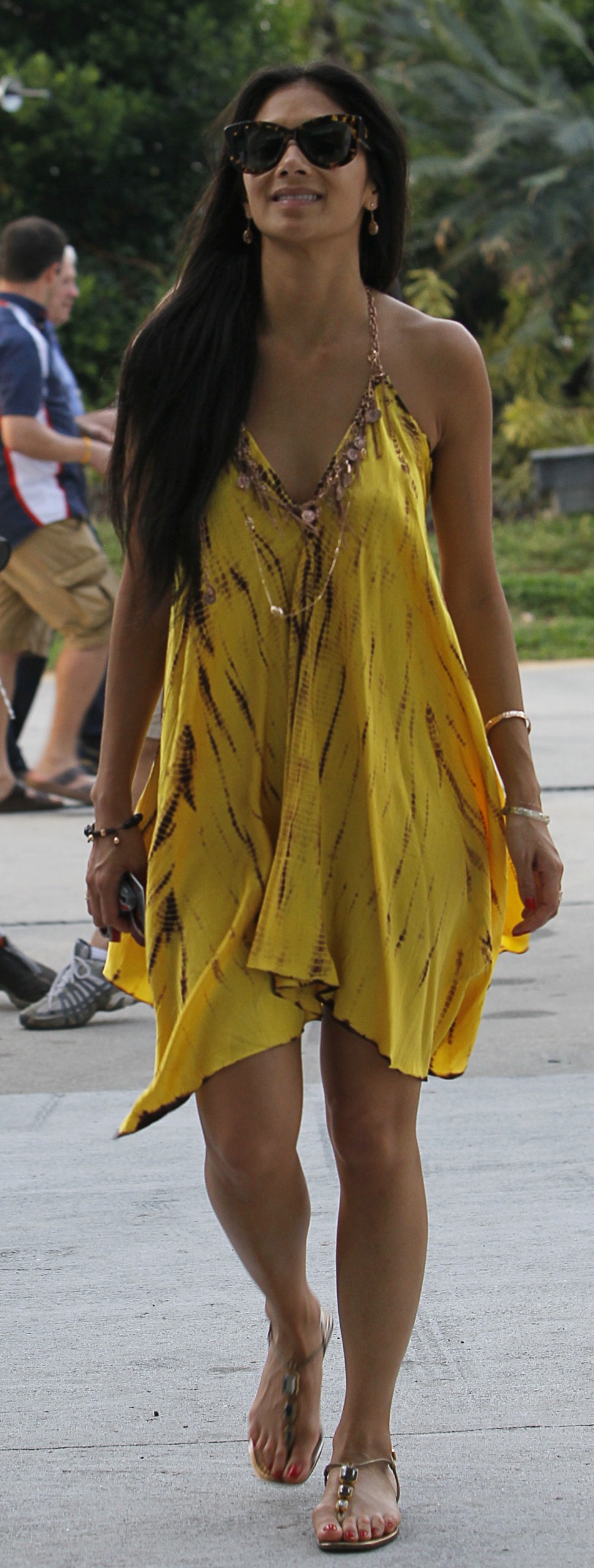 Nicole Scherzinger, girlfriend of McLarens driver Hamilton, walks in the paddock after the qualifying session of the Malaysian F1 Grand Prix at Sepang International Circuit