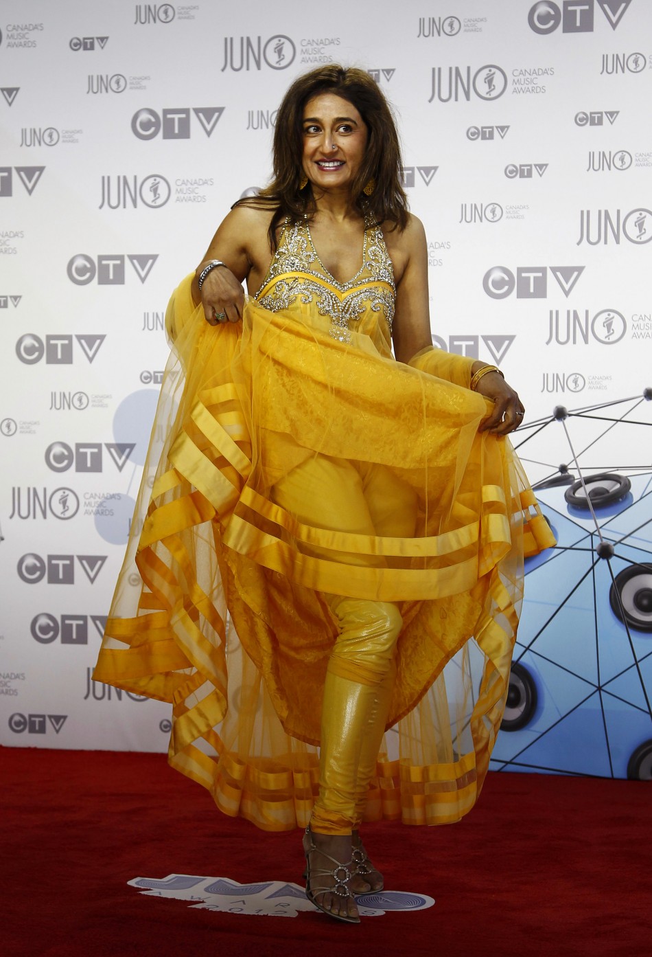 Recording artist Kiran Ahluwalia arrives on the red carpet during the 41st Juno Awards in Ottawa