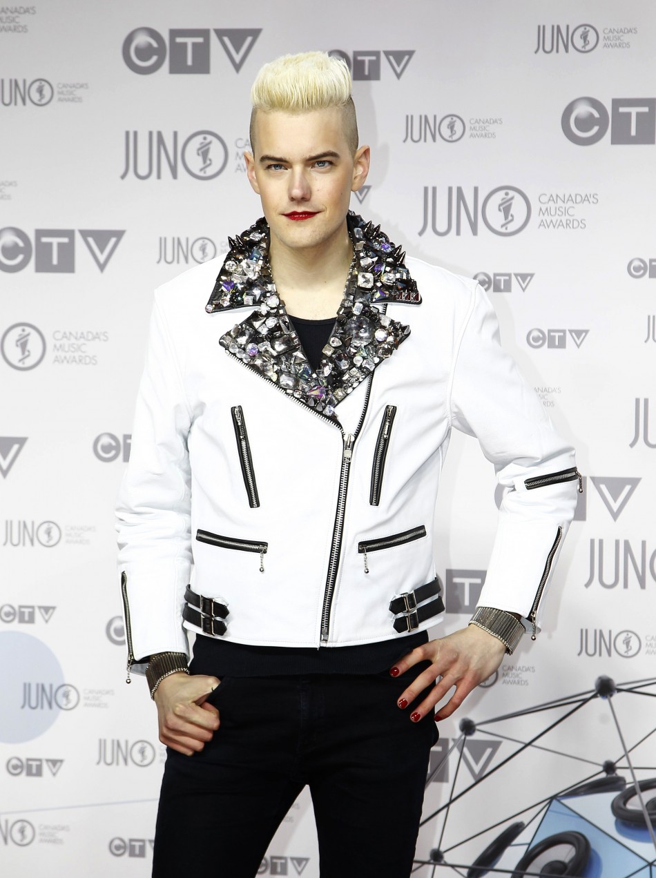 Recording artist Diamond Rings arrives on the red carpet during the 41st Juno Awards in Ottawa