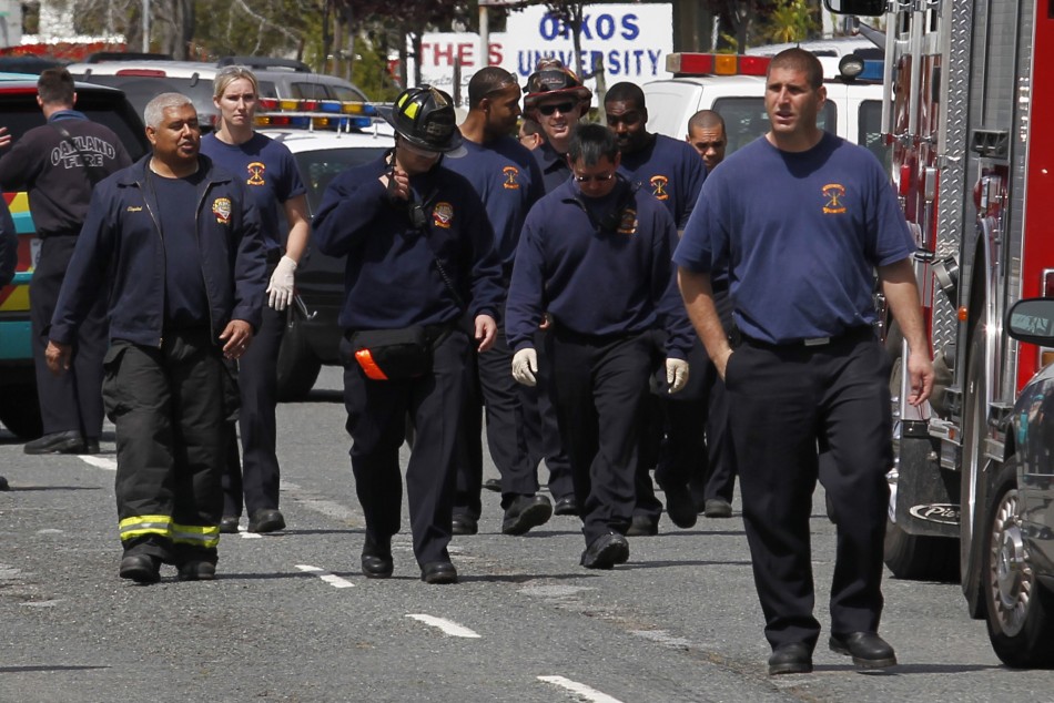 Fire fighters leave the site of a multiple shooting at a private Christian college in Oakland