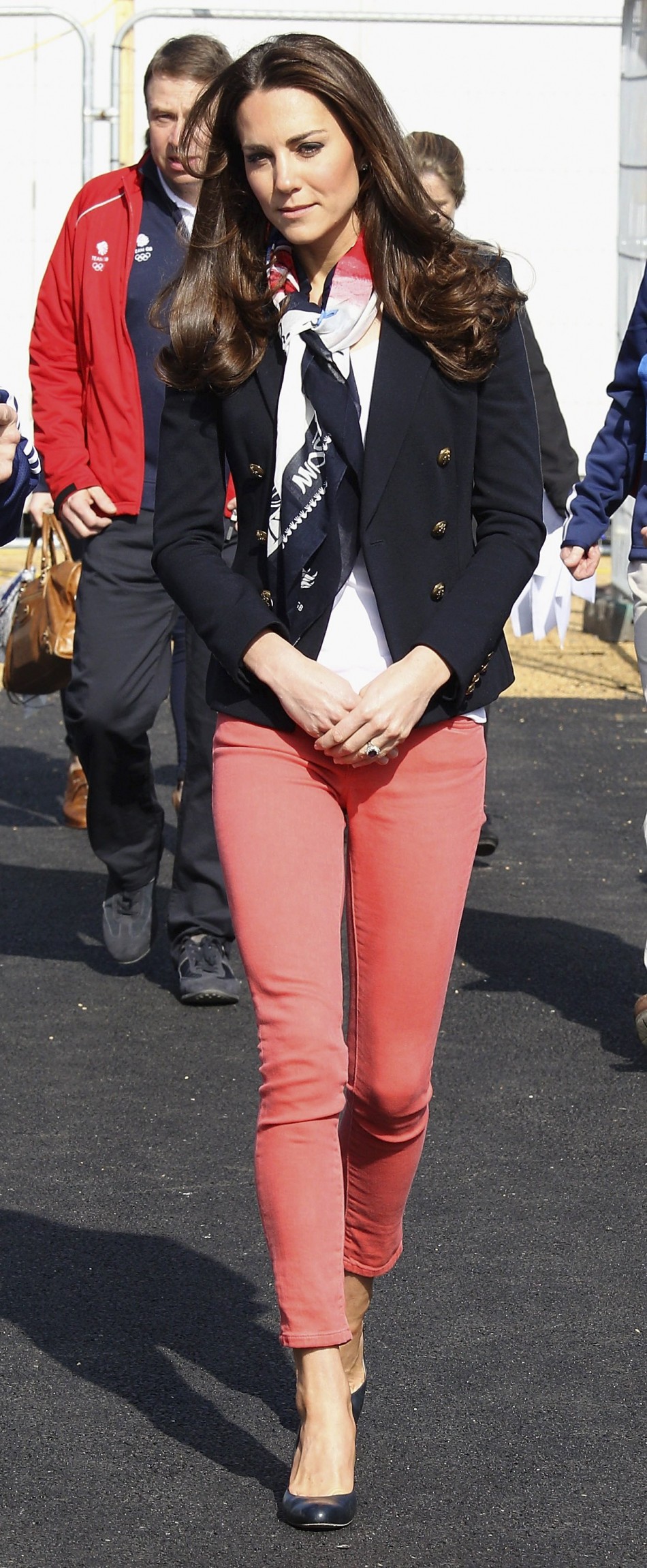 Britains Catherine, Duchess of Cambridge wears the Team GB official supporters scarf for London 2012, during her visit to the Olympic Park in London
