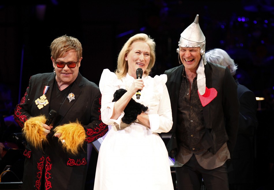 Elton John and Sting perform with Meryl Streep during the benefit quotSongs From the Silverscreenquot to raise funds for The Rainforest Trust at Caregie Hall in New York