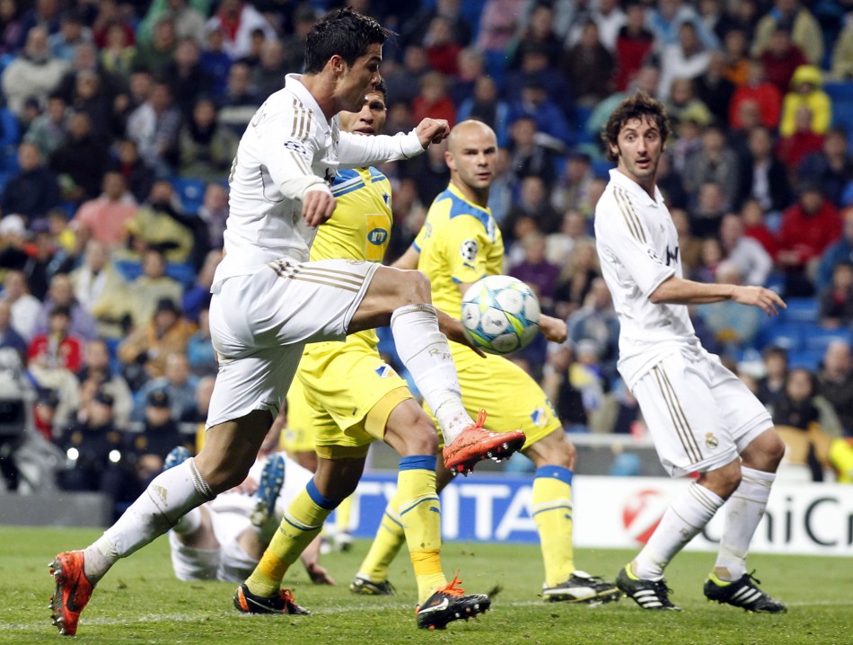 Real Madrid039s Ronaldo shoots to score against APOEL during their Champions League quarter-final second leg soccer match in Madrid