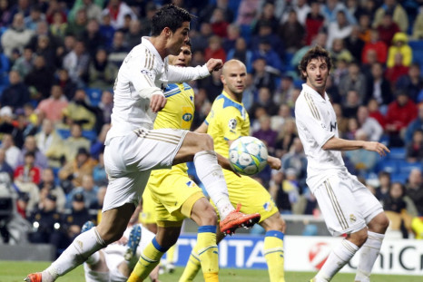 Real Madrid&#039;s Ronaldo shoots to score against APOEL during their Champions League quarter-final second leg soccer match in Madrid