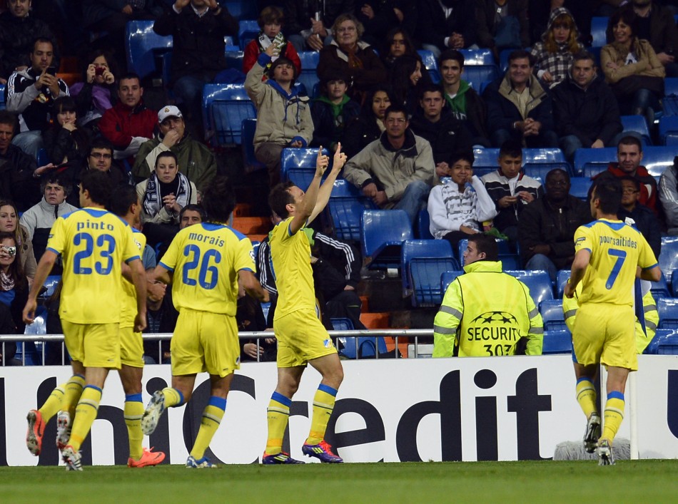 APOEL039s players celebrate a goal during their Champions League quarter-final second leg soccer match against Real Madrid in Madrid