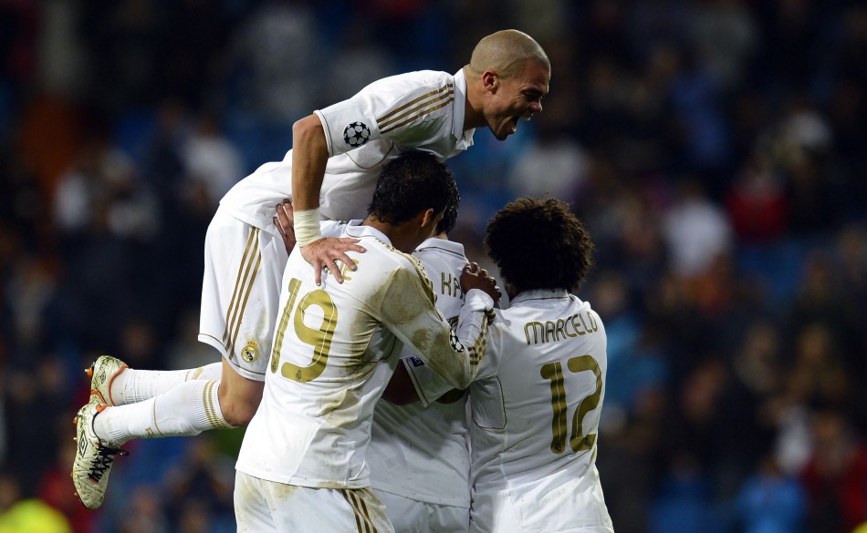 Real Madrid039s players celebrate a goal against APOEL during their Champions League quarter-final second leg soccer match at Santiago Bernabeu stadium in Madrid