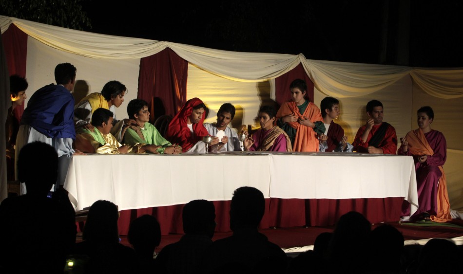 Actors take part in a quotVia Crucisquot re-enactment of the Last Supper during a Good Friday celebration in Luque