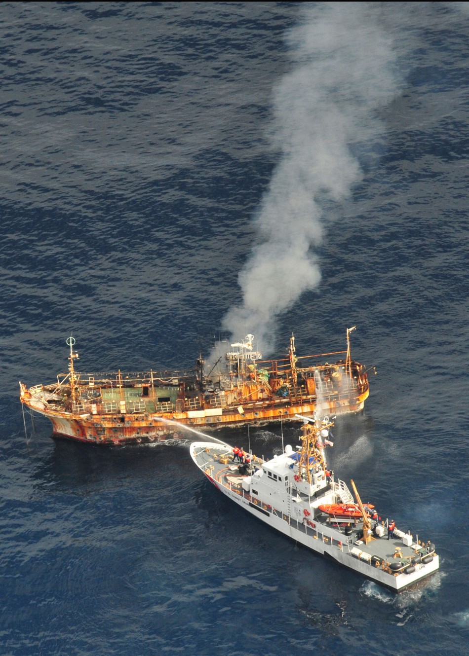 US Coast Guard Canon Fire Sinks Japanese Ghost Ship Adrift Since Tsunami PHOTOS