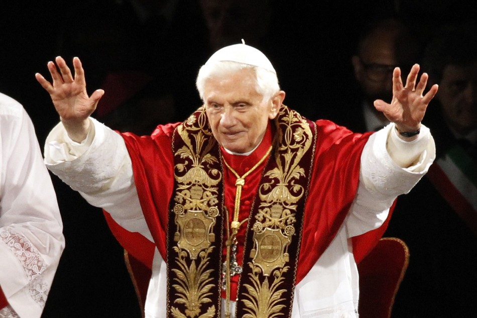 Pope Benedict XVI waves at the end of the Via Crucis Way of the Cross procession at the Colosseum in downtown Rome