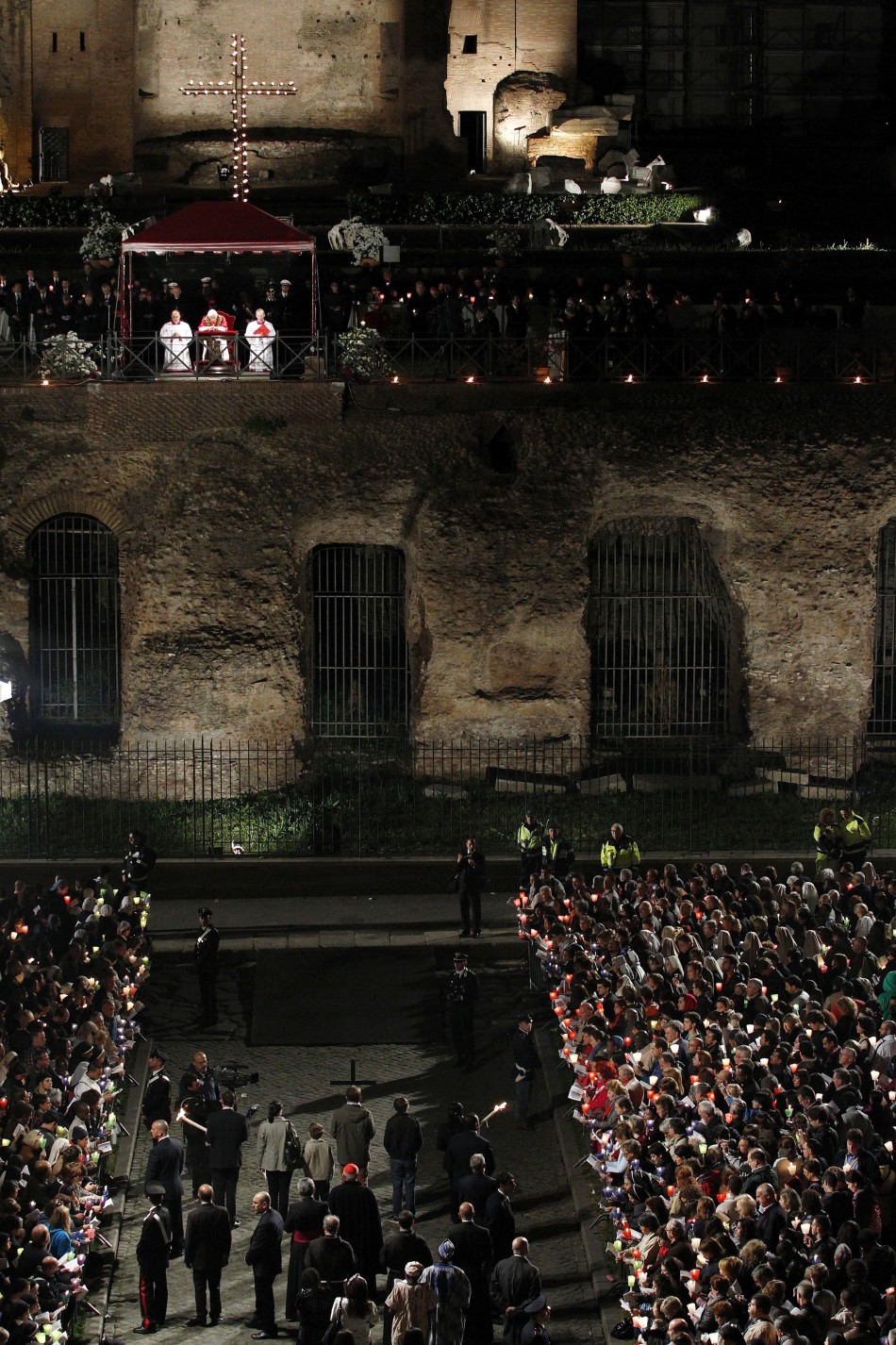 Pope Benedict XVI leads the Via Crucis procession at the Colosseum in downtown Rome