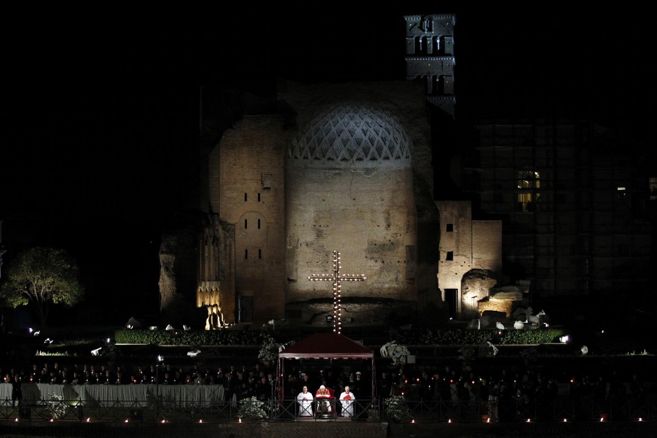 Pope Benedict XVI leads the Via Crucis procession at the Colosseum in downtown Rome