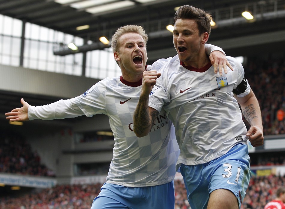 Aston Villa039s Herd celebrates his goal against Liverpool with Bannan during their English Premier League soccer match in Liverpool