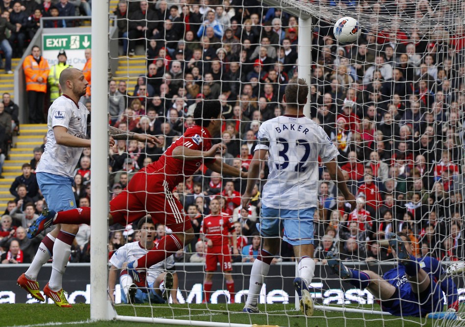 Liverpool039s Suarez scores against Aston Villa during their English Premier League soccer match in Liverpool