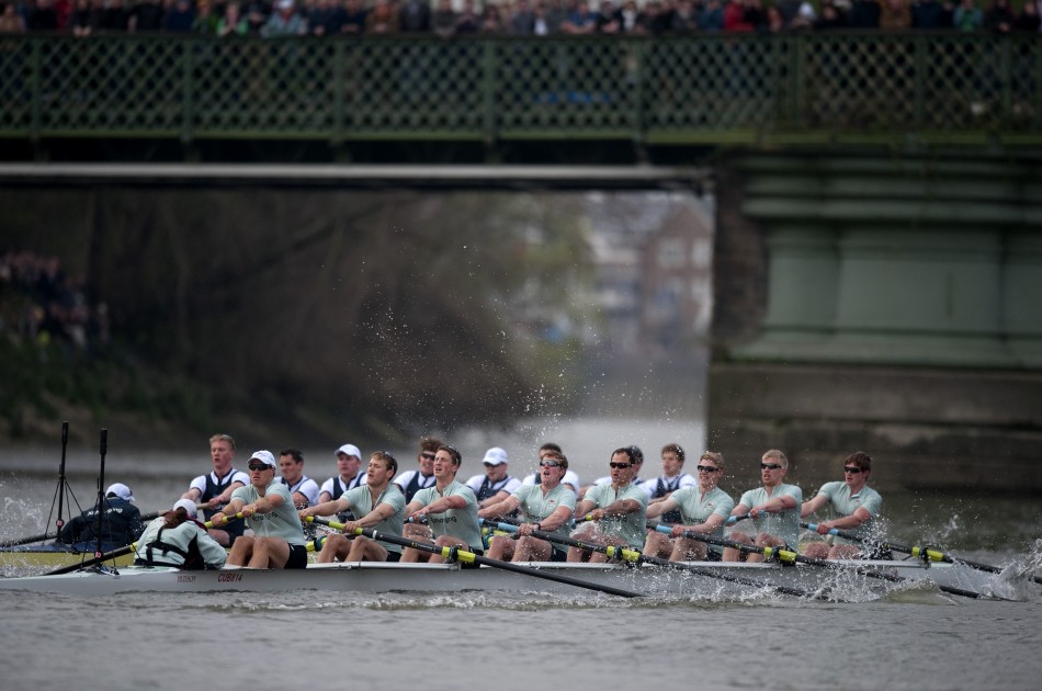 The Oxford and Cambridge rowing teams compete during the 157th Boat Race on the River Thames in London