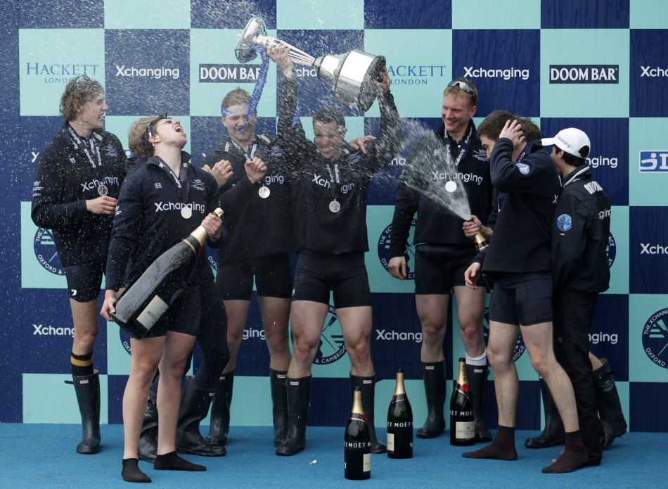 Oxford rowing team celebrate after winning against Cambridge in the 157th Boat Race in London