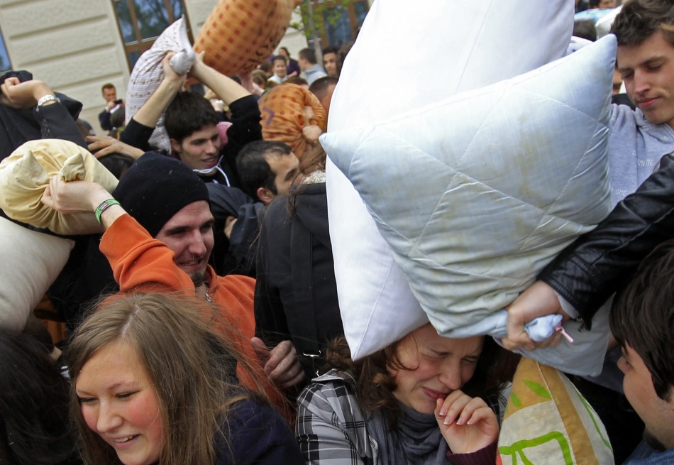 People fight with pillows during International Pillow Fight Day in Budapest