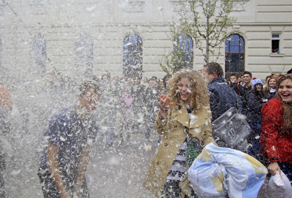 People fight with pillows during International Pillow Fight Day in Budapest