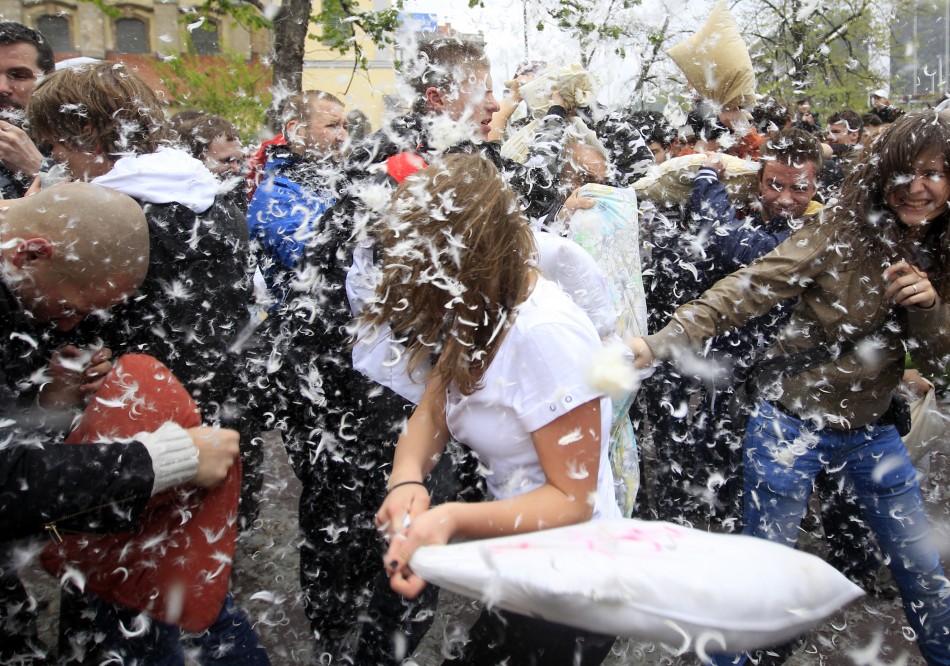 People fight with pillows during International Pillow Fight Day in Budapest April 7, 2012