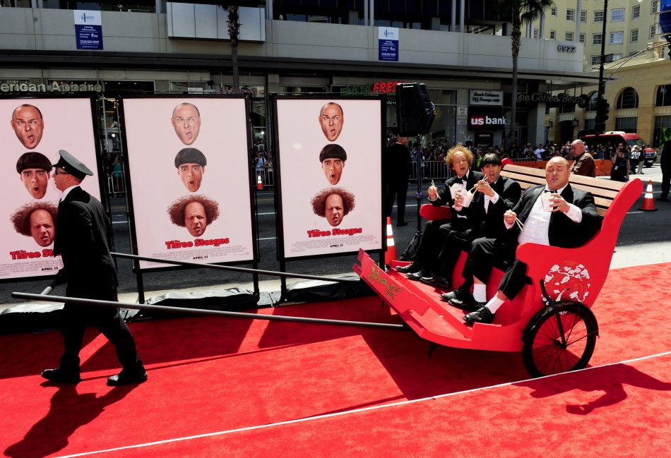 Actors Hayes who plays Larry, Diamantopoulos who plays Moe and Sasso who plays Curly arrive in a rickshaw in character during the Hollywood premiere of quotThe Three Stooges The Moviequot in Los Angeles
