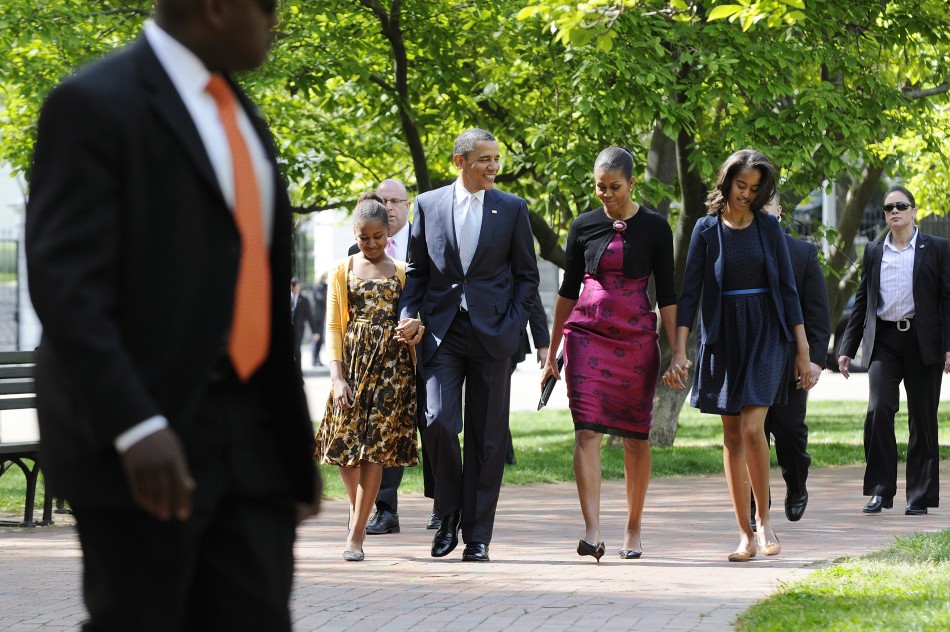Obama and family walking to the church