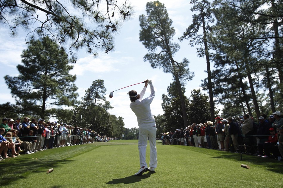 Watson of the U.S. hits his tee shot on the ninth hole during second round play in the 2012 Masters Golf Tournament in Augusta