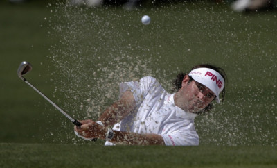 Watson of the U.S. hits from a sand trap on the second hole during final round play in the 2012 Masters Golf Tournament in Augusta Watson of the U.S. hits from a sand trap on the second hole during final round play in the 2012 Masters Golf Tournament in Augusta