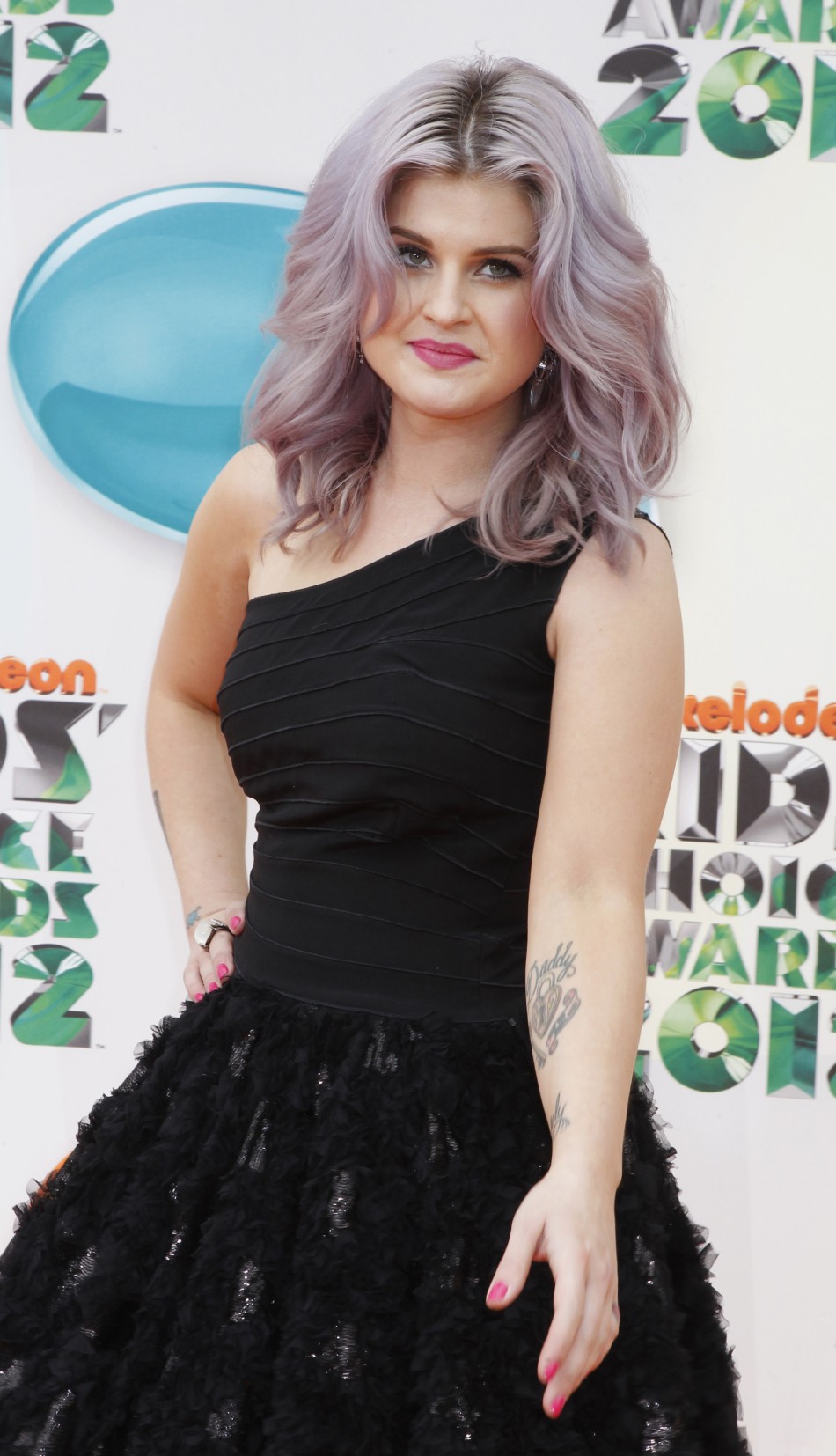 Actress Kelly Osbourne poses at Nickelodeons 25th annual Kids Choice Awards in Los Angeles