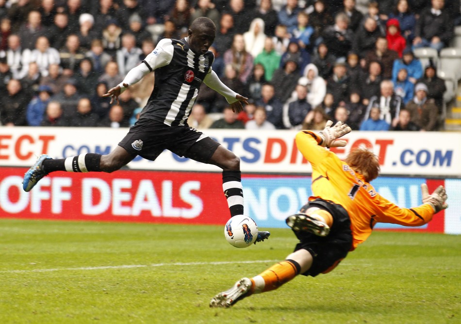 Newcastle United039s Cisse scores against Bolton Wanderers during their English Premier League soccer match in Newcastle