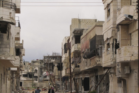 Houses damaged by the government army, according to the opposition, are seen in the Inshaat district of Homs