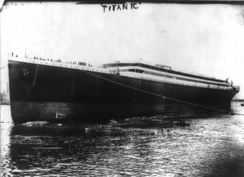Titanic is launched into River Lagan for towing to fitting-out berth where her engines, funnels and interiors would be installed