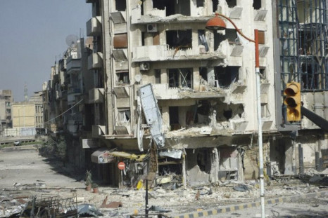 Buildings damaged in Homs from violence in Syria