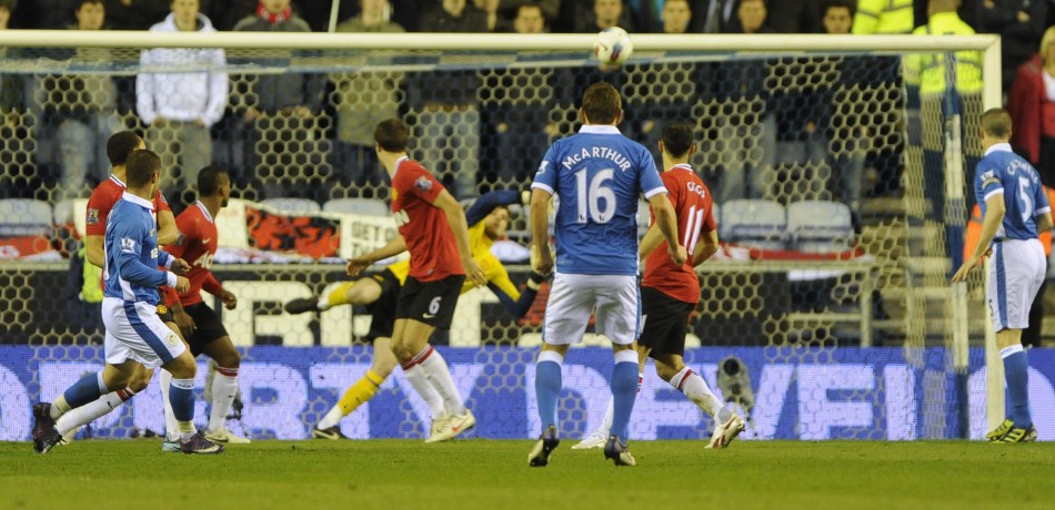 Wigan Athletic039s Maloney scores against Manchester United during their English Premier League soccer match at the DW Stadium Wigan